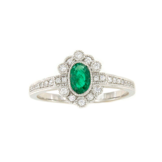 Anillo LONGA  roseta esmeralda oval y brillantes oro blanco de 18 ktes.
