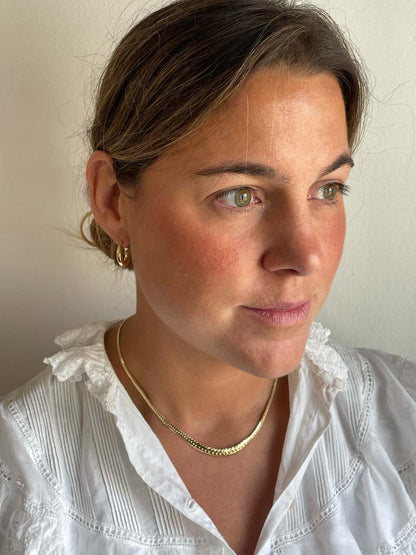 DINA choker with diminishing links and curb chain in 18k yellow gold