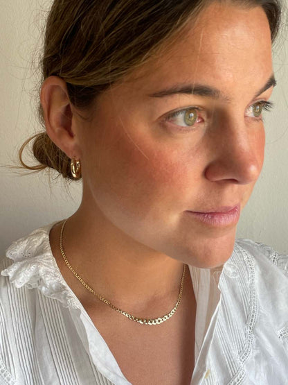 DINA choker with diminishing links and curb chain in 18k yellow gold