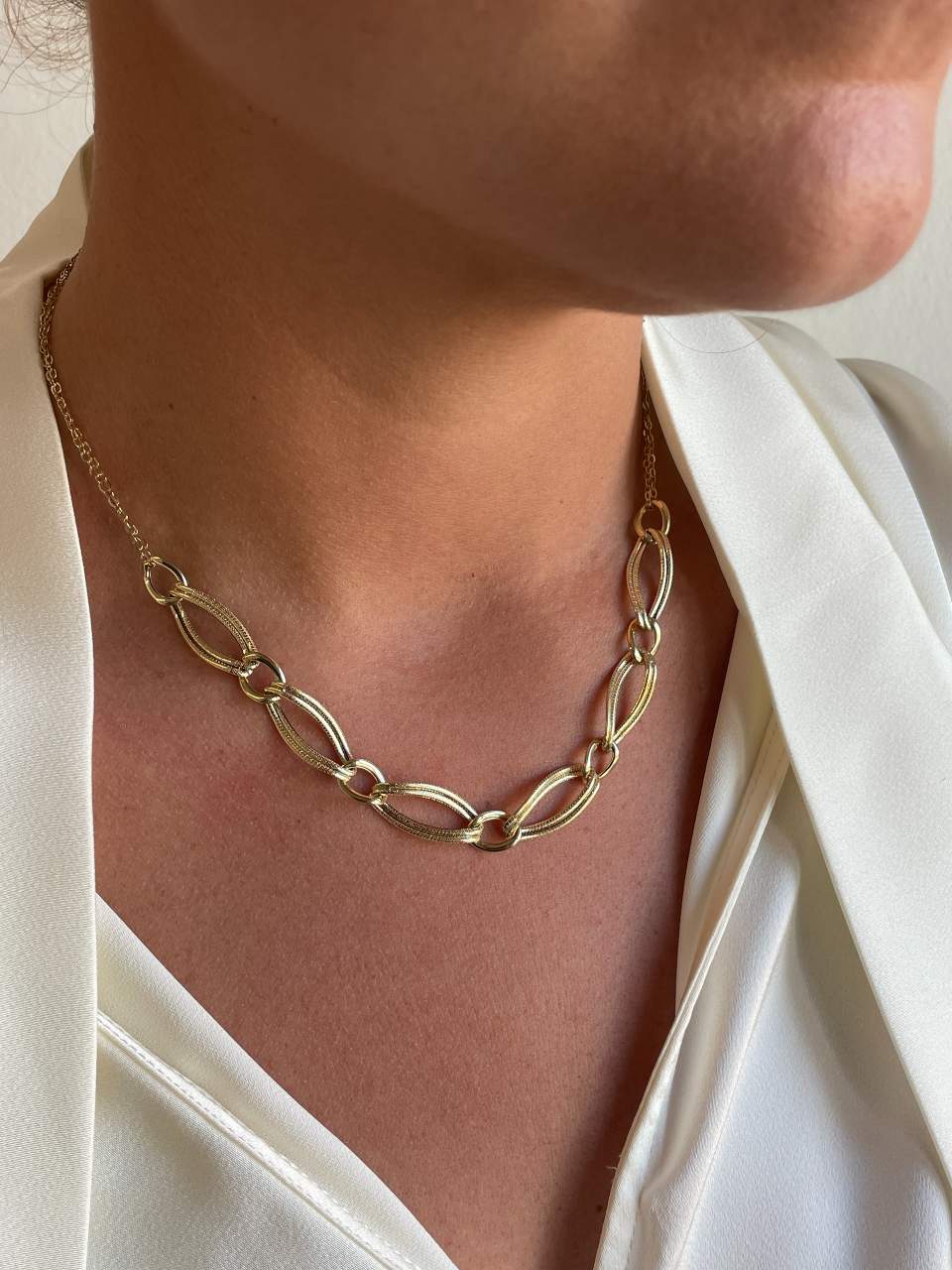 DAKOTA gargantilla eslabones barbados en oro amarillo 18 ktes.