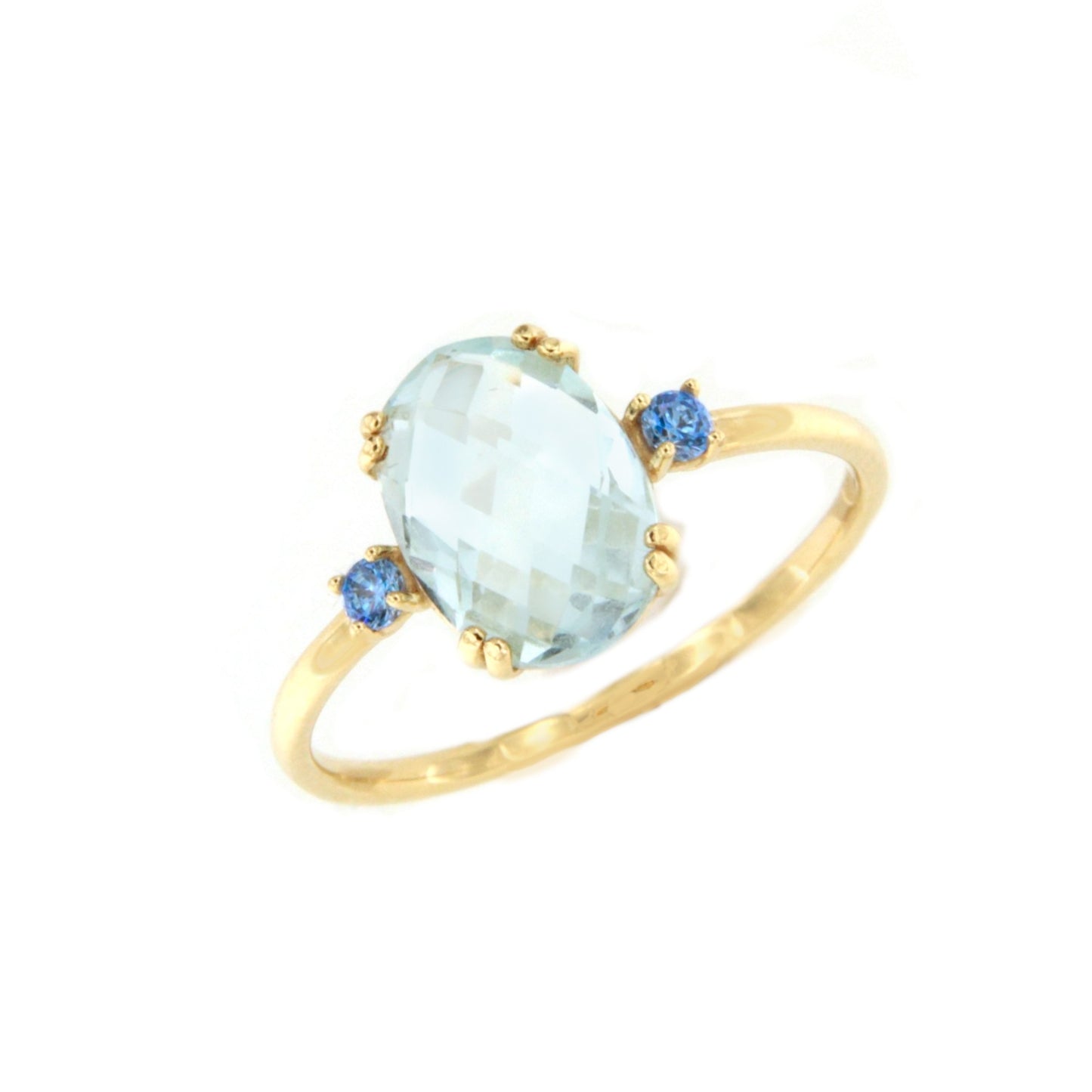 Anillo QUITO amatista o topacio azul en oro amarillo de 18 kilates
