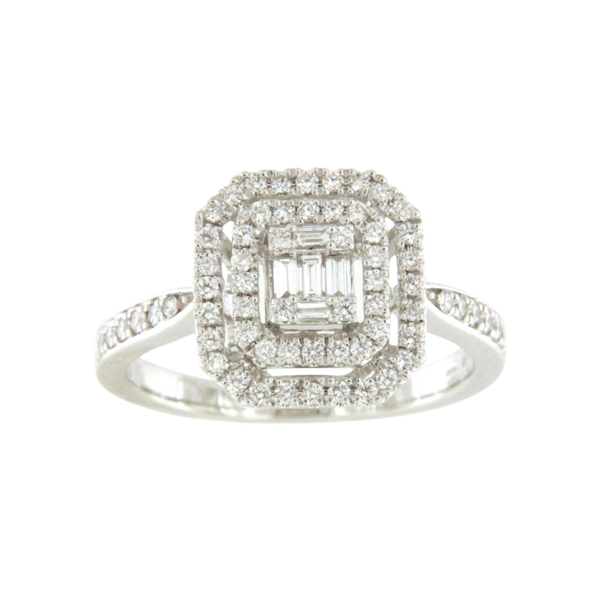 Anillo CLIO en oro blanco 18 ktes con centro en brillantes y baguettes.