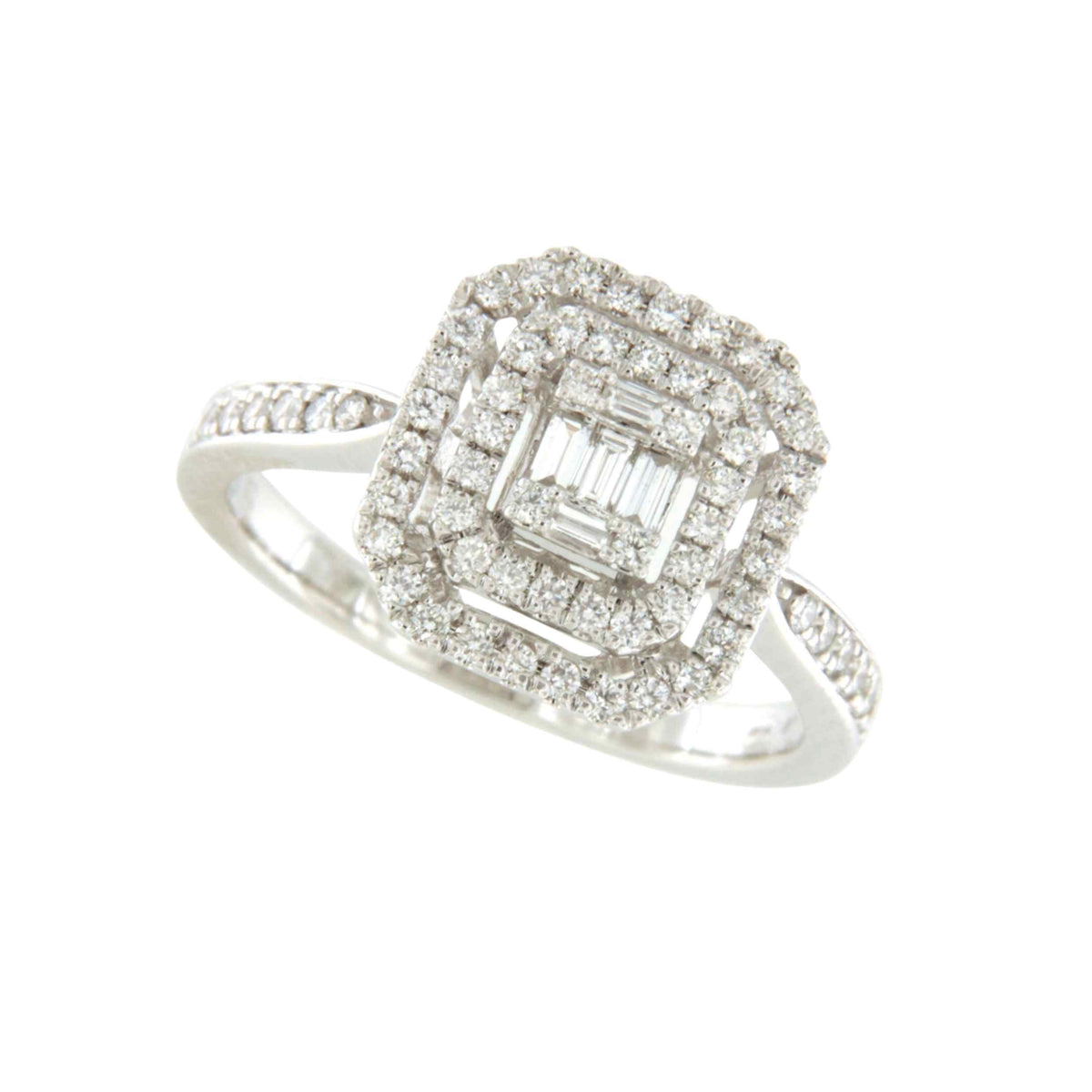 Anillo CLIO en oro blanco 18 ktes con centro en brillantes y baguettes.
