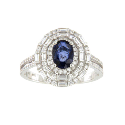 POIO ring with sapphire center and diamonds in 18k white gold.