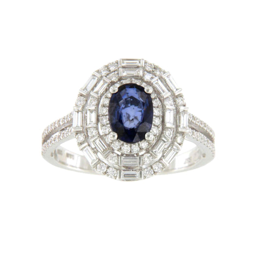 POIO ring with sapphire center and diamonds in 18k white gold.