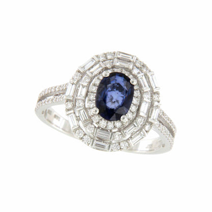 POIO ring with sapphire center and diamonds in 18k white gold.