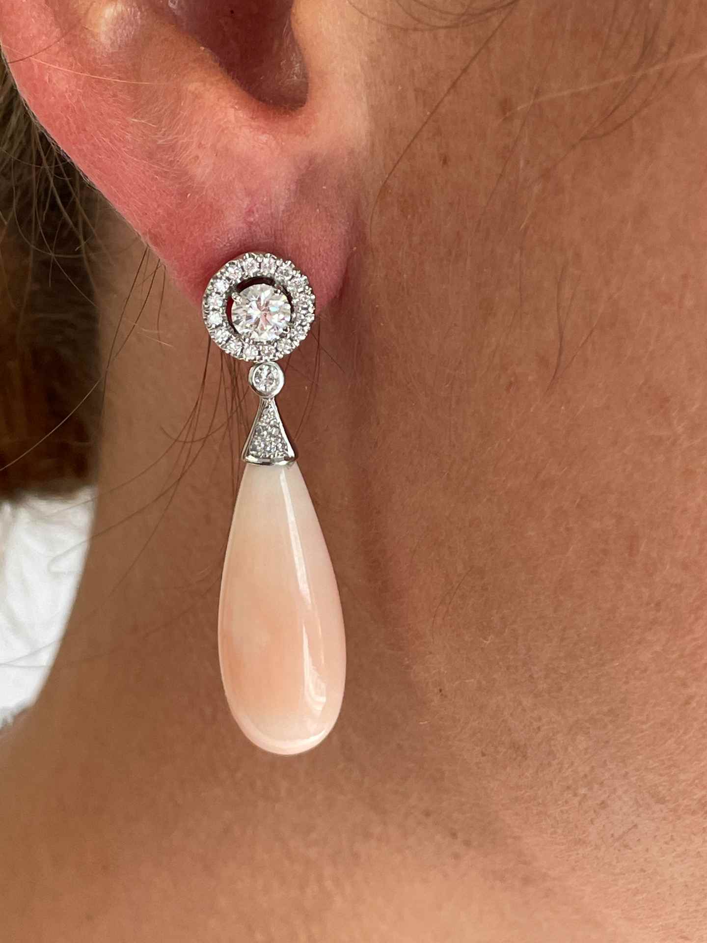 FERRARA solitaire earrings surrounded by diamonds in 18k white gold