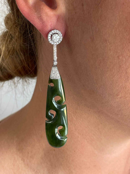 FERRARA solitaire earrings surrounded by diamonds in 18k white gold