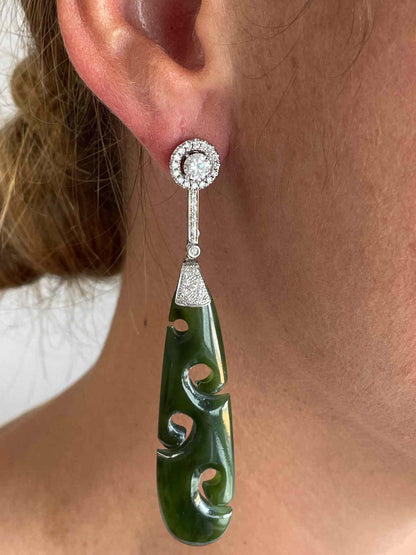 FERRARA solitaire earrings surrounded by diamonds in 18k white gold