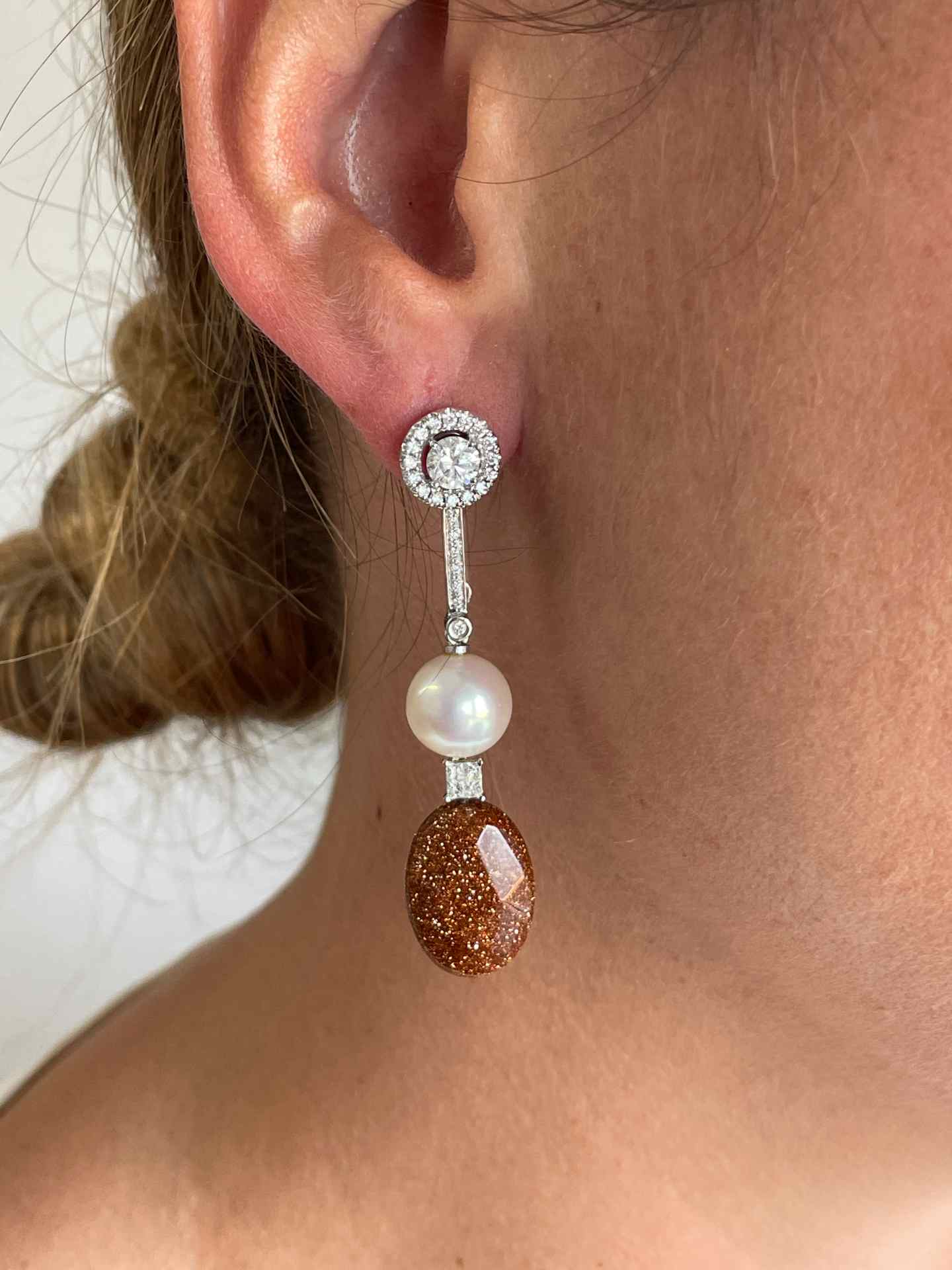 FERRARA solitaire earrings surrounded by diamonds in 18k white gold