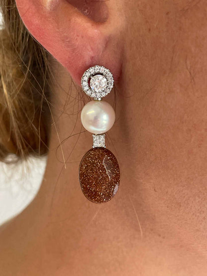 FERRARA solitaire earrings surrounded by diamonds in 18k white gold