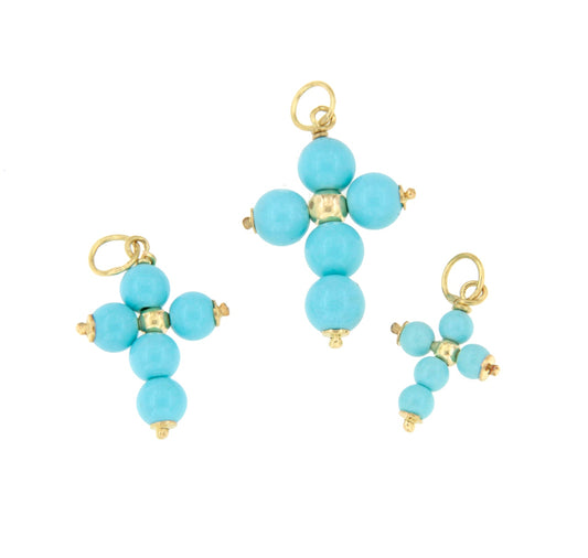 Colgante cruz OASIS de oro de 18 kilates y turquesa