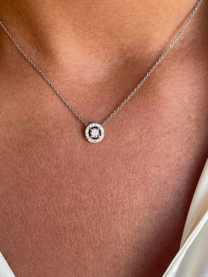 LINZ 18 Karat white gold chain with diamond solitaire.