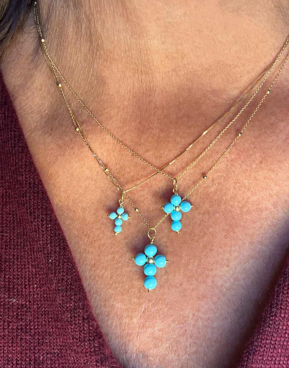 Colgante cruz OASIS de oro de 18 kilates y turquesa