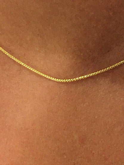 Cadenita FASUN clásico cordón trenzado oro amarillo 18 kts - Roman Joyero