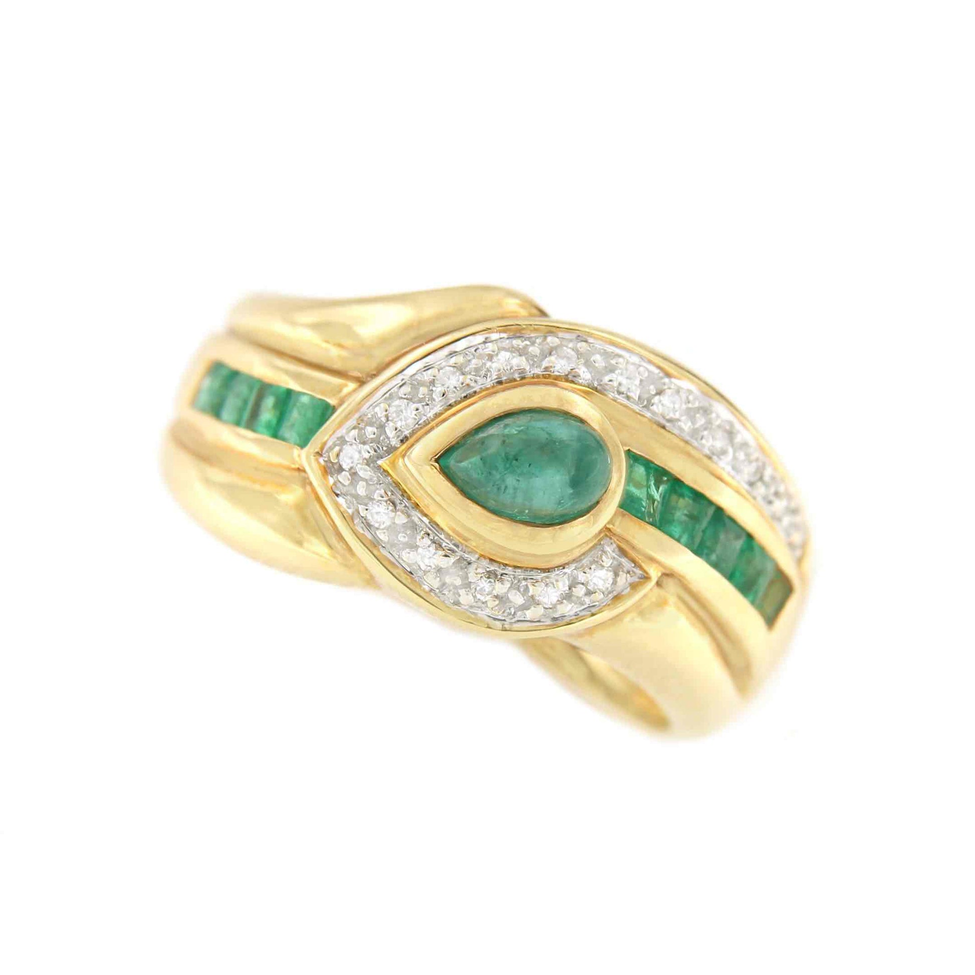 NAMIK anillo oro amarillo de 18 kts brillantes y esmeraldas