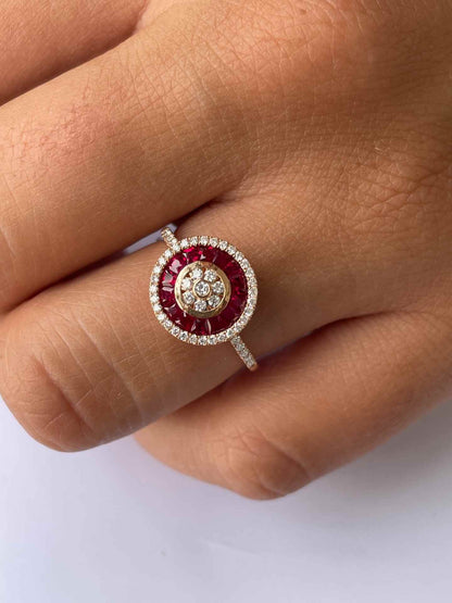 CARIQUEO anillo oro 18 redondo con brillantes y taipes de zafiros