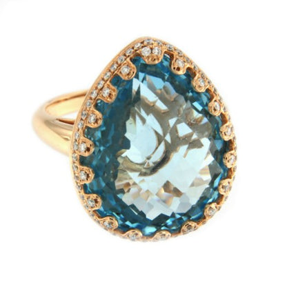 BOLERO, anillo de oro rosa con diamantes y topacio azul - Roman Joyero