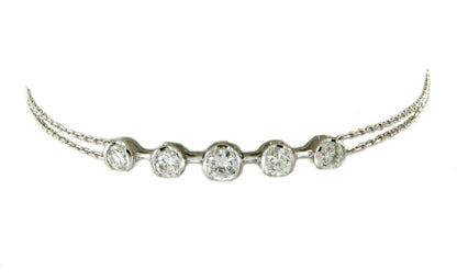 Pulsera de oro blanco 18 kts con diamantes en talla brillante - Roman Joyero