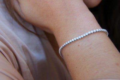 Pulsera riviere en oro blanco de 18 kts con diamante - Roman Joyero