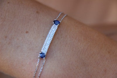 Pulsera de oro blanco de 18 Kt con diamantes y zafiros azules - Roman Joyero